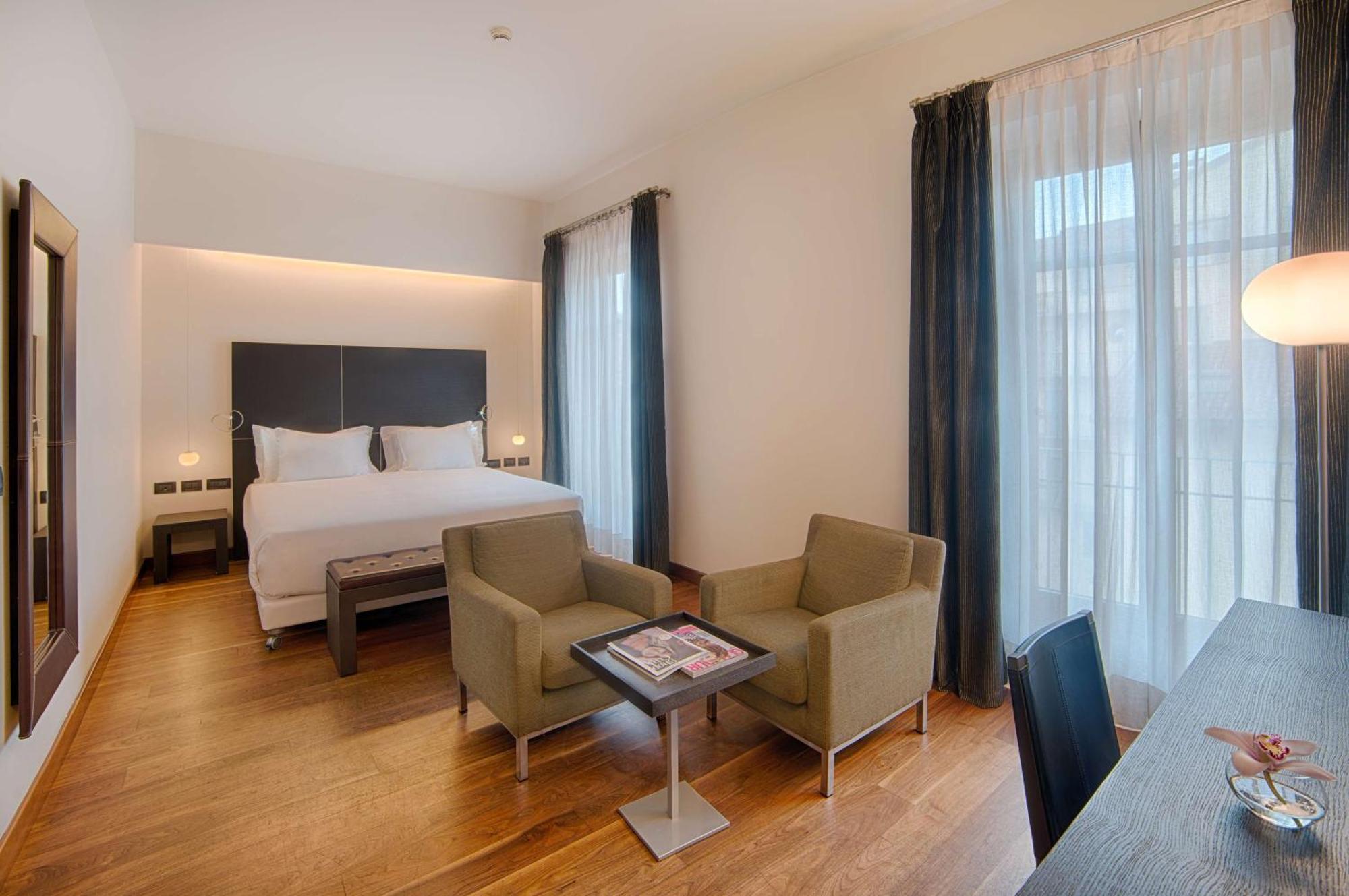 Hotel NH Collection Torino Santo Stefano Esterno foto