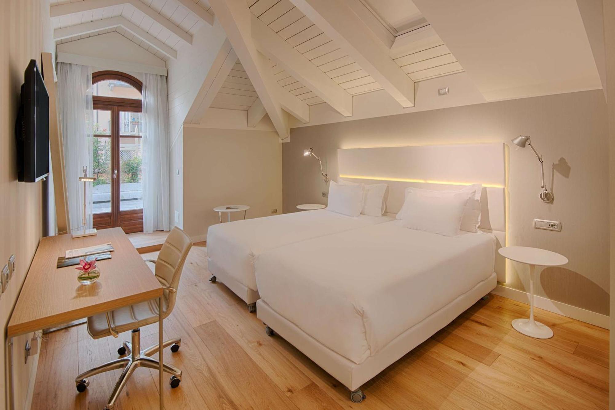 Hotel NH Collection Torino Santo Stefano Esterno foto