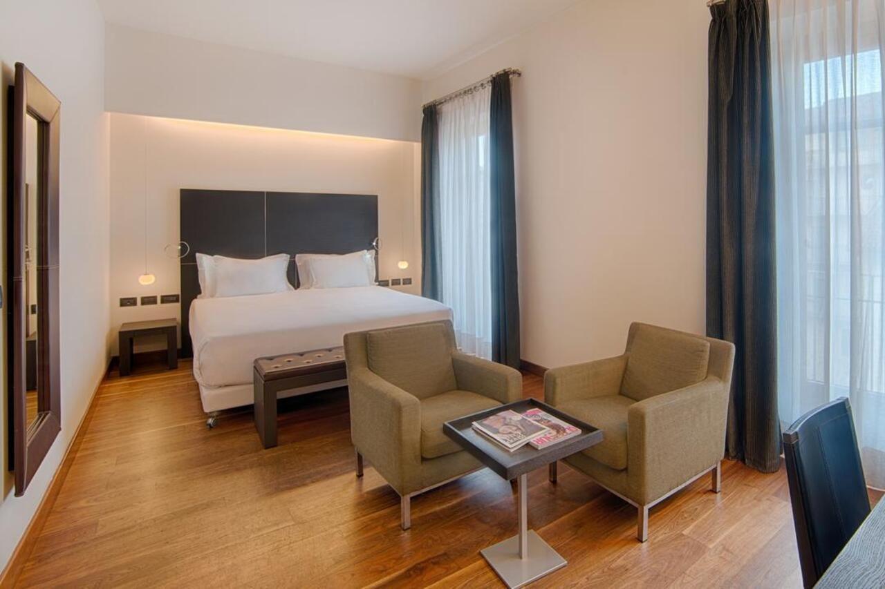 Hotel NH Collection Torino Santo Stefano Esterno foto